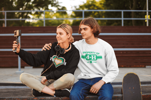 hoodie-and-sweatshirt-mockup-of-two-teens-taking-a-selfie-37932-r-el2